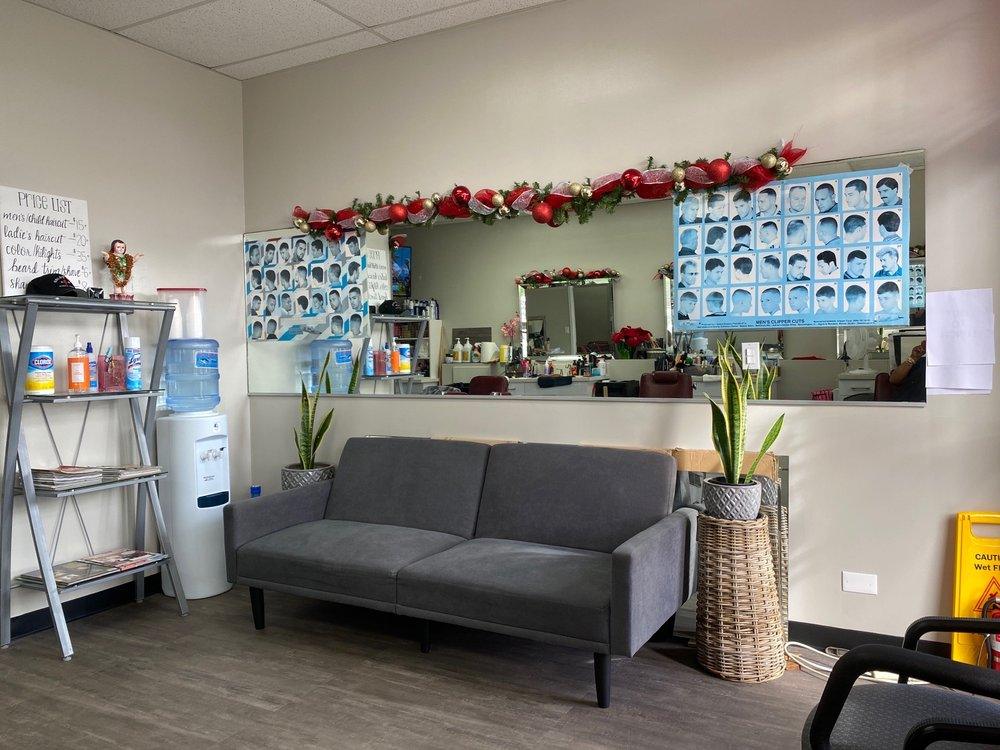 Inside the shop with price board and chairs